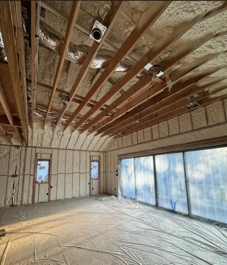 Interior walls and ceiling insulated with spray foam during new construction in Brandywine