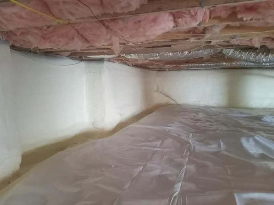Crawl space encapsulation with closed-cell spray foam for Storm Damage Roof Repair in Brandywine